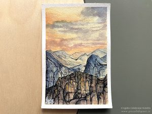 Dipinto ad acquerello su carta di 10x15 cm che raffigura un paesaggio montano.